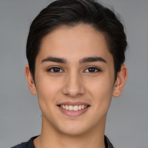 Joyful white young-adult female with short  brown hair and brown eyes