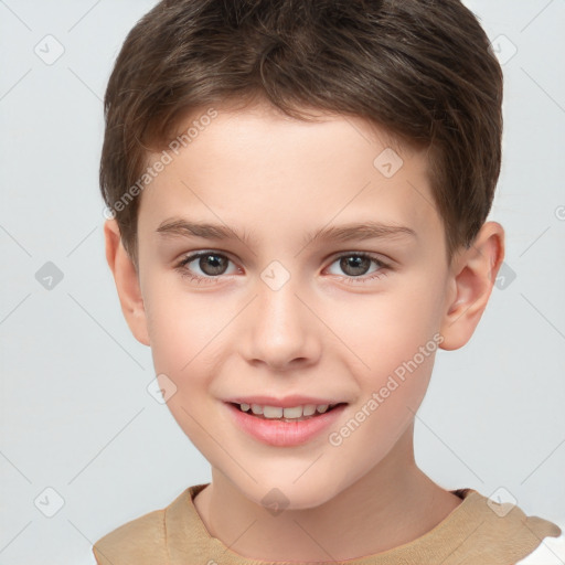 Joyful white child male with short  brown hair and brown eyes