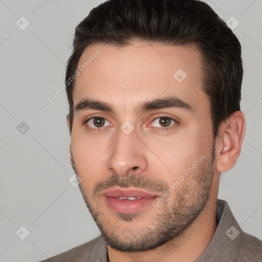 Joyful white young-adult male with short  brown hair and brown eyes