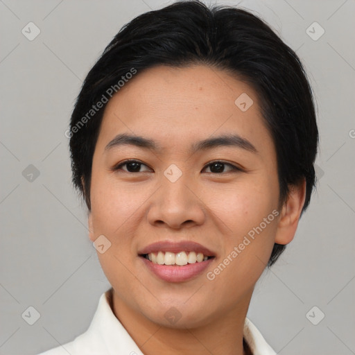 Joyful asian young-adult female with medium  black hair and brown eyes