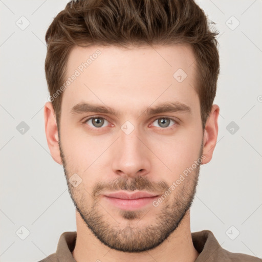 Neutral white young-adult male with short  brown hair and grey eyes