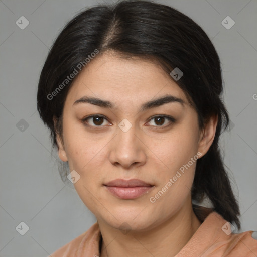 Joyful latino young-adult female with medium  brown hair and brown eyes