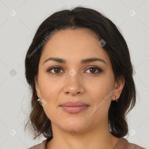 Joyful latino young-adult female with medium  brown hair and brown eyes