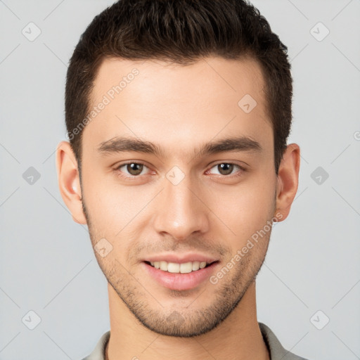 Joyful white young-adult male with short  brown hair and brown eyes