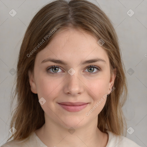 Joyful white young-adult female with medium  brown hair and blue eyes