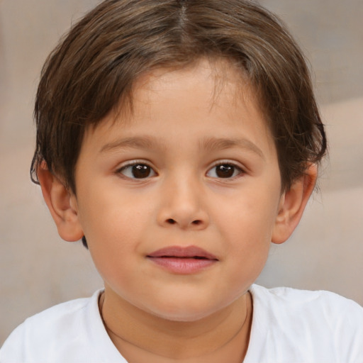 Joyful white child male with short  brown hair and brown eyes