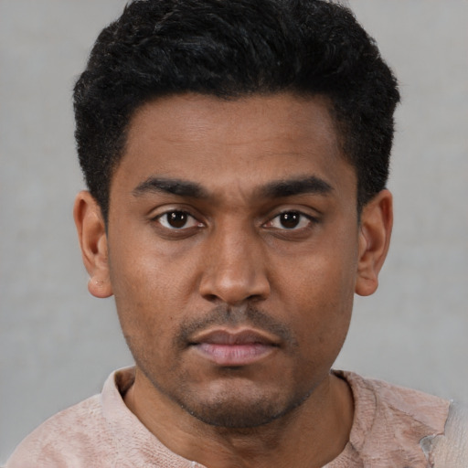 Neutral latino young-adult male with short  black hair and brown eyes