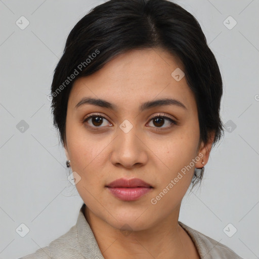 Joyful asian young-adult female with medium  black hair and brown eyes