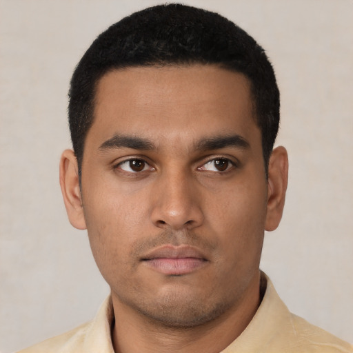 Neutral latino young-adult male with short  black hair and brown eyes