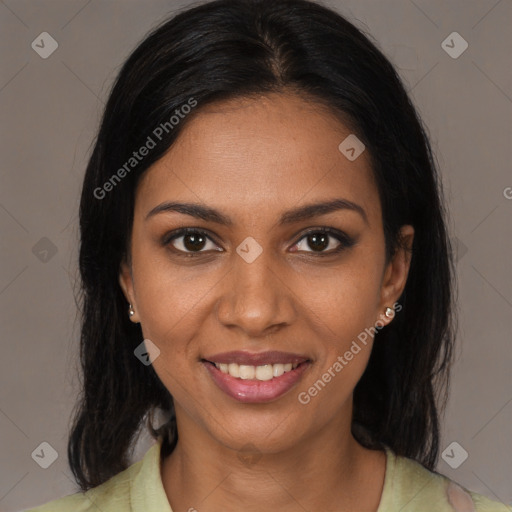 Joyful black young-adult female with medium  brown hair and brown eyes