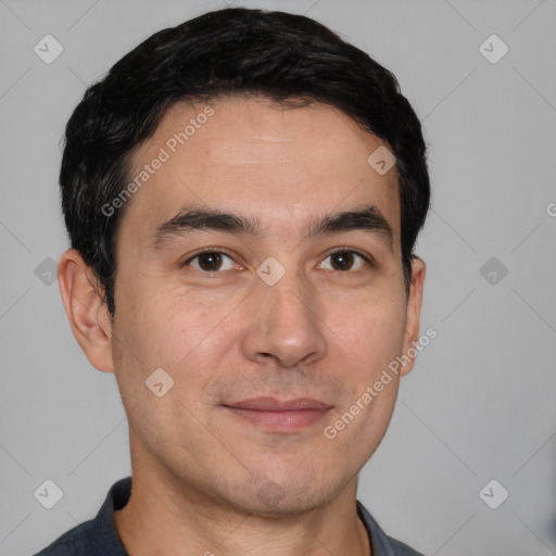 Joyful white young-adult male with short  black hair and brown eyes