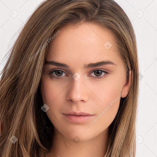 Neutral white young-adult female with long  brown hair and brown eyes