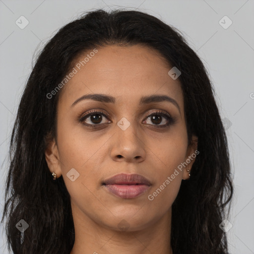 Joyful latino young-adult female with long  brown hair and brown eyes