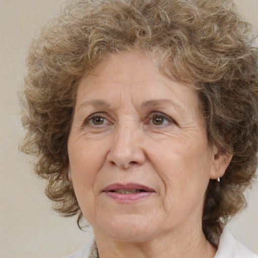 Joyful white middle-aged female with medium  brown hair and brown eyes