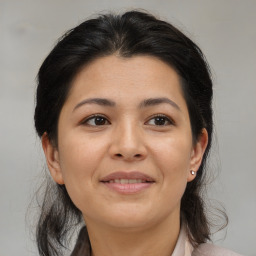 Joyful asian young-adult female with medium  brown hair and brown eyes