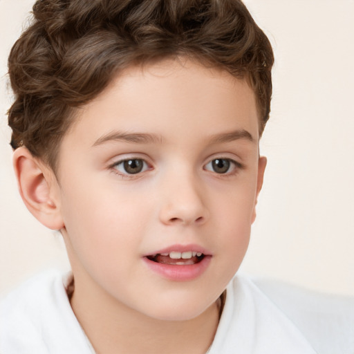 Joyful white child male with short  brown hair and brown eyes