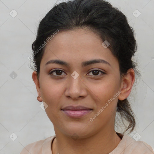 Joyful latino young-adult female with short  brown hair and brown eyes