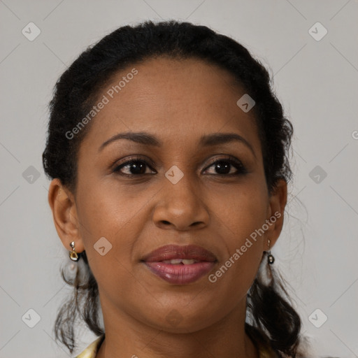 Joyful black young-adult female with medium  brown hair and brown eyes