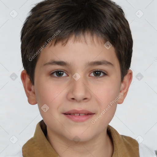 Joyful white child male with short  brown hair and brown eyes