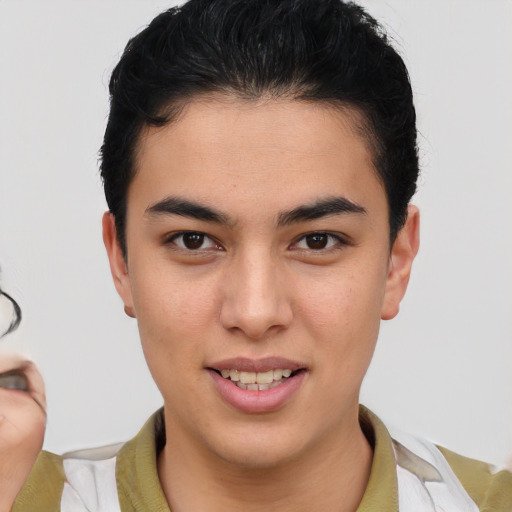 Joyful latino young-adult male with short  brown hair and brown eyes