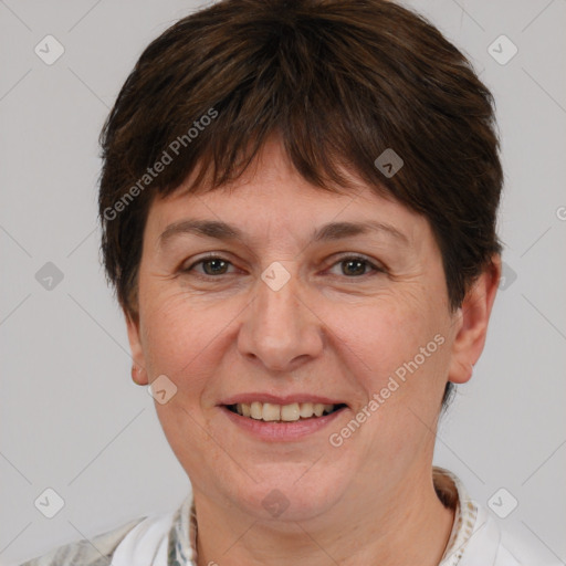 Joyful white adult female with short  brown hair and brown eyes