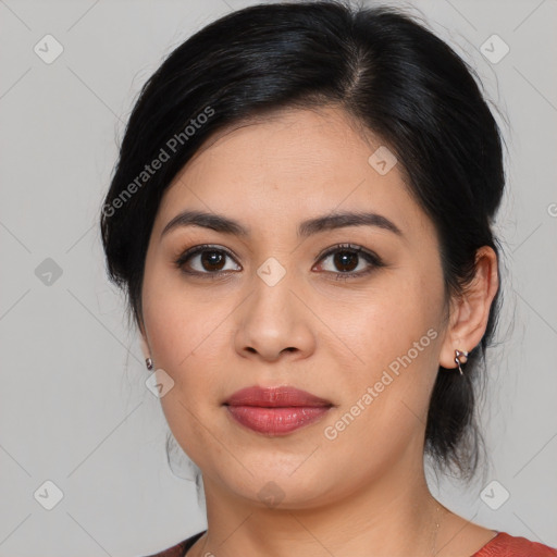 Joyful latino young-adult female with medium  brown hair and brown eyes