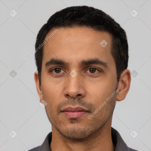 Neutral latino young-adult male with short  black hair and brown eyes