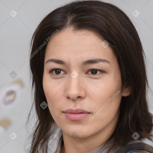 Neutral white young-adult female with long  brown hair and brown eyes