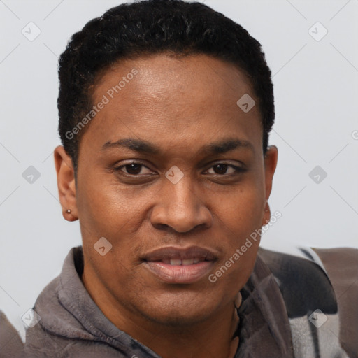 Joyful black young-adult female with short  black hair and brown eyes
