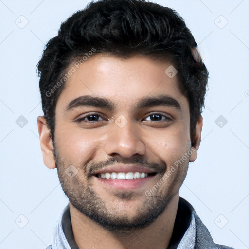 Joyful white young-adult male with short  black hair and brown eyes