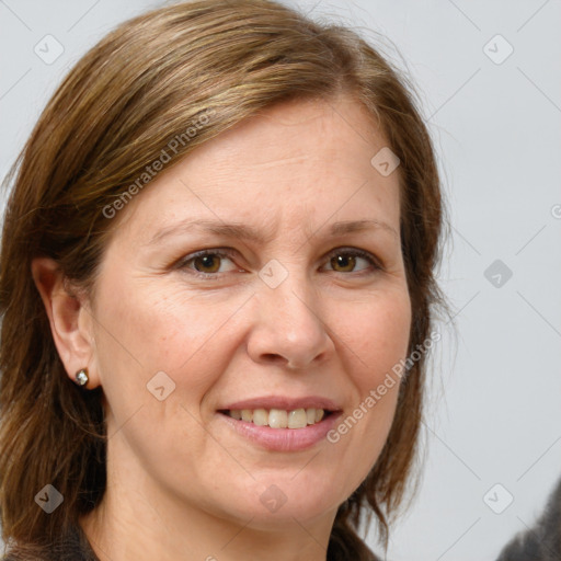 Joyful white adult female with medium  brown hair and grey eyes