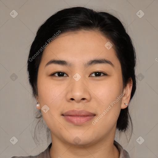 Joyful asian young-adult female with medium  brown hair and brown eyes