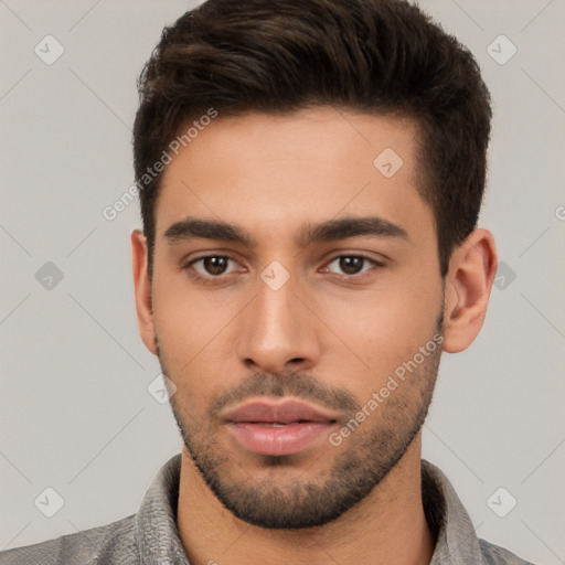 Neutral white young-adult male with short  brown hair and brown eyes