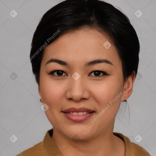 Joyful asian young-adult female with short  black hair and brown eyes