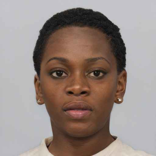 Neutral black young-adult female with short  brown hair and brown eyes