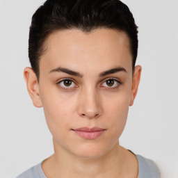 Neutral white young-adult female with short  brown hair and brown eyes