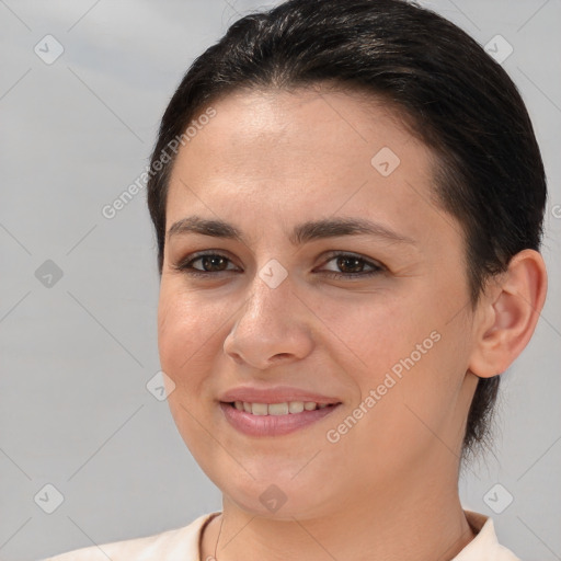 Joyful white young-adult female with medium  brown hair and brown eyes