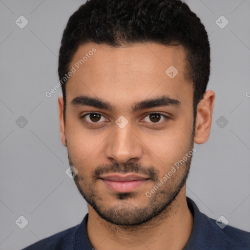 Neutral latino young-adult male with short  black hair and brown eyes