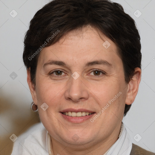 Joyful white adult female with short  brown hair and brown eyes