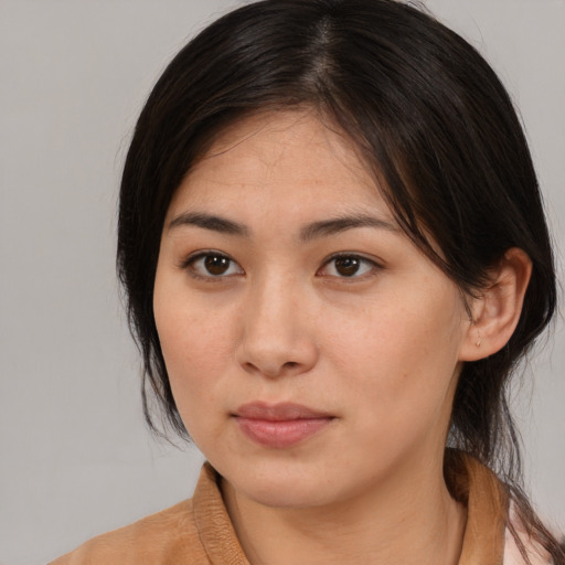 Neutral asian young-adult female with medium  brown hair and brown eyes