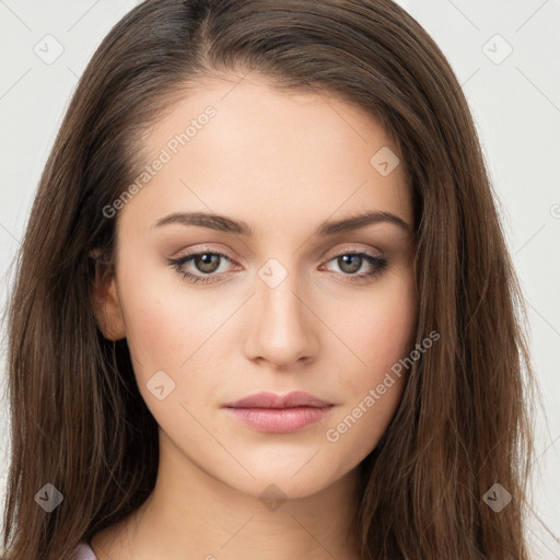 Neutral white young-adult female with long  brown hair and brown eyes