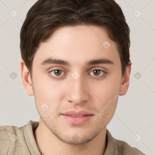 Neutral white young-adult male with short  brown hair and grey eyes