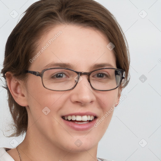 Joyful white young-adult female with medium  brown hair and blue eyes