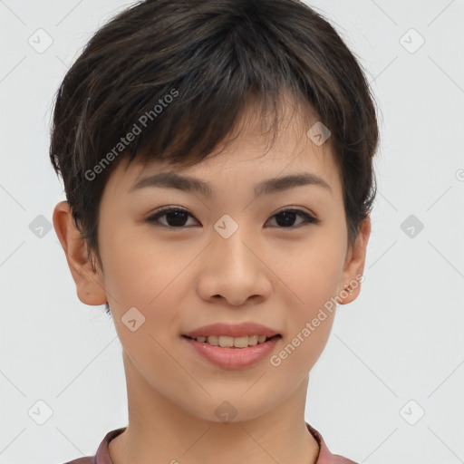 Joyful asian young-adult female with short  brown hair and brown eyes