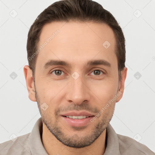 Joyful white young-adult male with short  brown hair and brown eyes