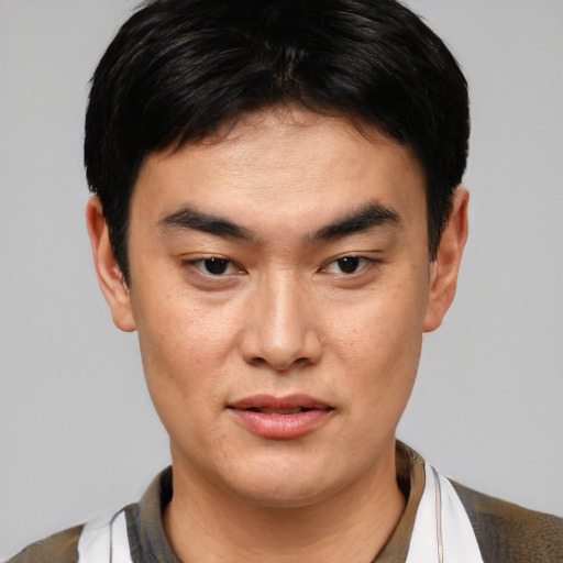 Neutral asian young-adult male with short  black hair and brown eyes