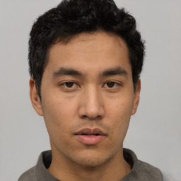 Neutral asian young-adult male with short  black hair and brown eyes