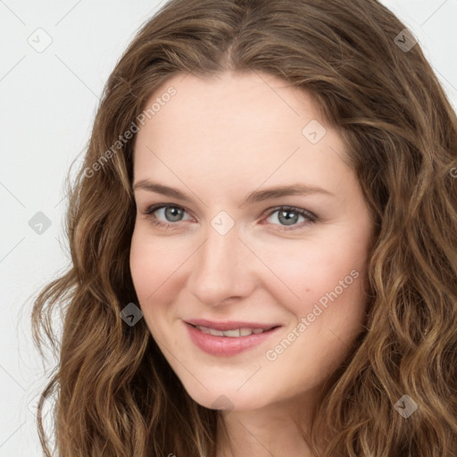 Joyful white young-adult female with long  brown hair and green eyes