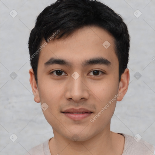 Joyful asian young-adult male with short  black hair and brown eyes