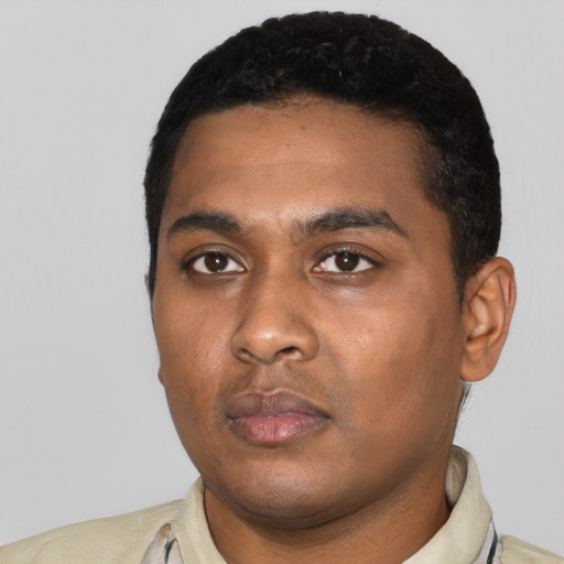 Neutral black young-adult male with short  black hair and brown eyes